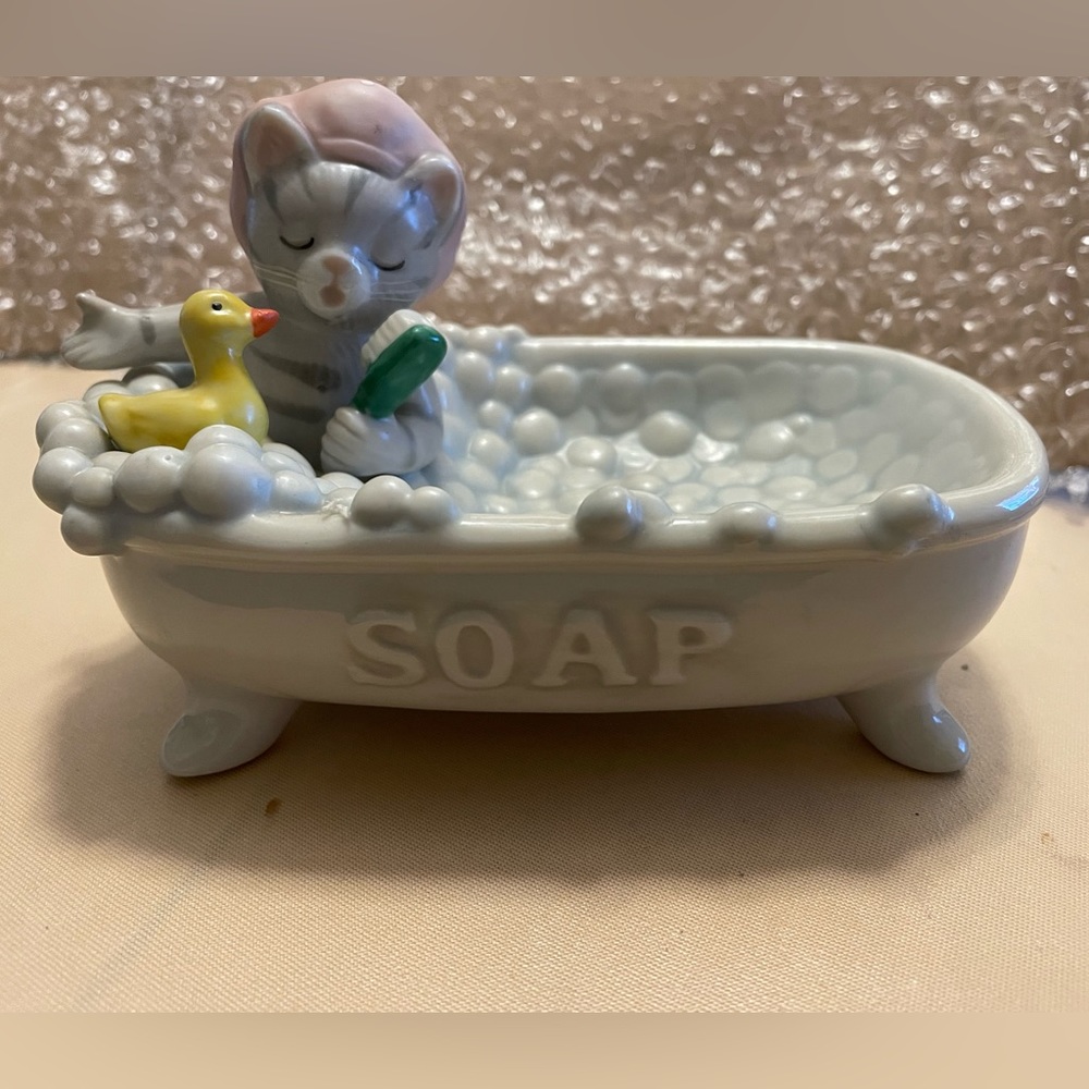 Missy cucumber in tub with duck . Sing a little song while sharing a bubble bath